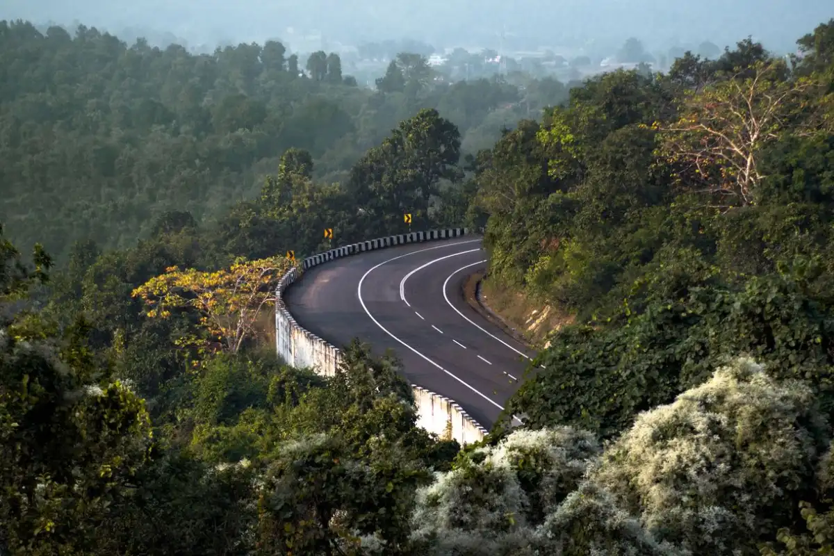 Road through green hills in Ranchi